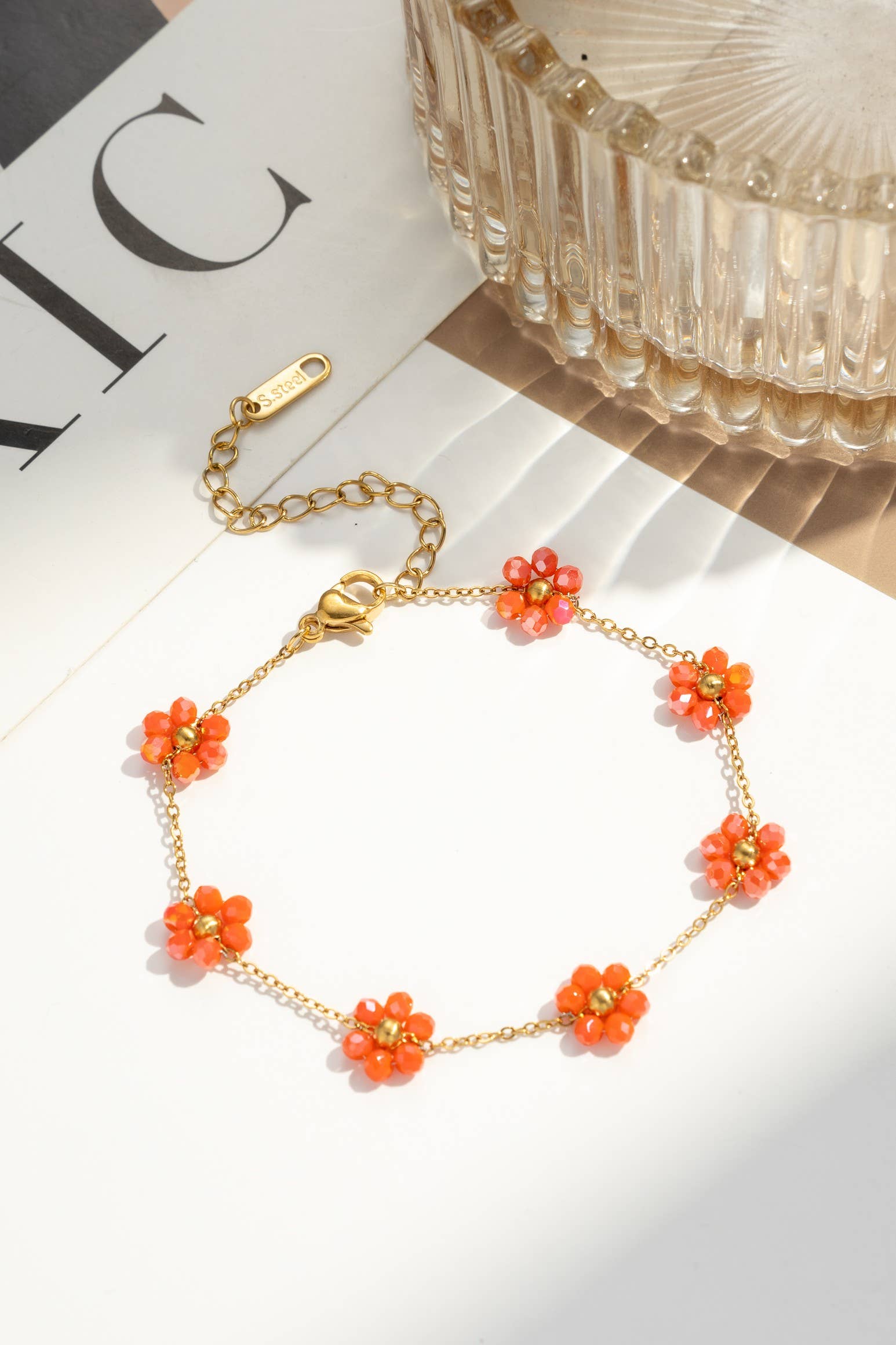 Bracelet acier inoxydable petite fleur colorée lumineux
